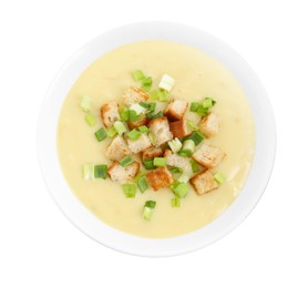 Photo of Tasty potato soup with croutons and green onion in bowl isolated on white, top view