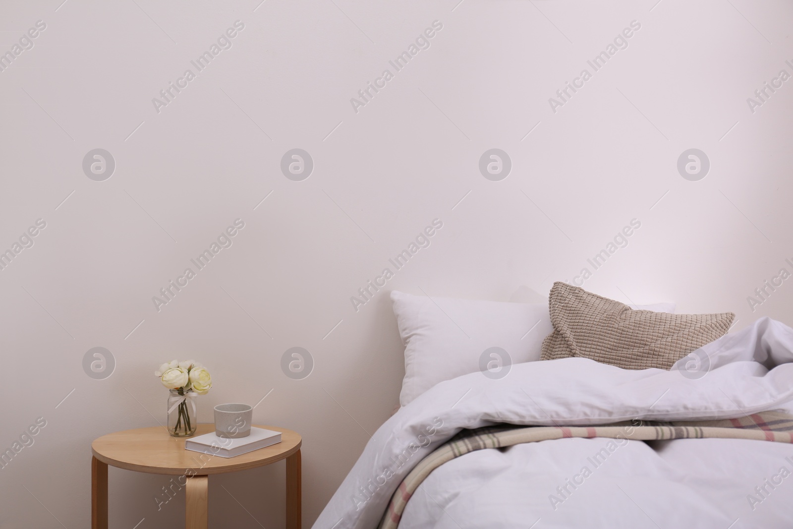 Photo of Modern teenager room interior with comfortable bed, space for text