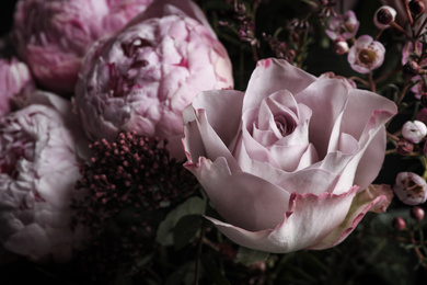 Photo of Beautiful bouquet of different flowers, closeup. Floral card design with dark vintage effect