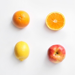 Fresh fruits on white background, top view