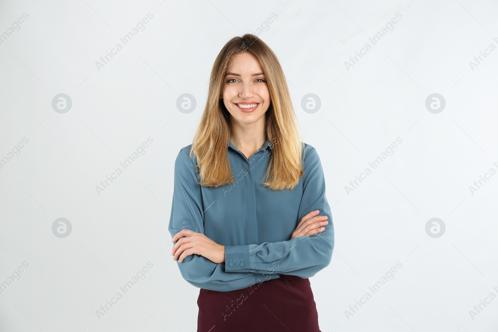 Photo of Portrait of beautiful young businesswoman on white background