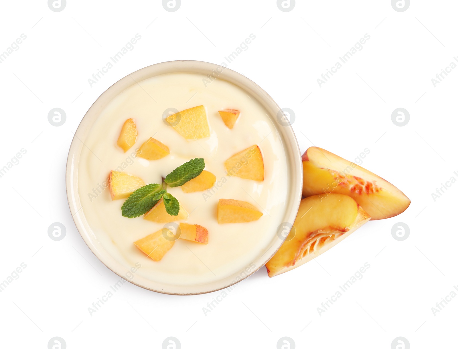Photo of Delicious yogurt with fresh peach and mint on white background, top view
