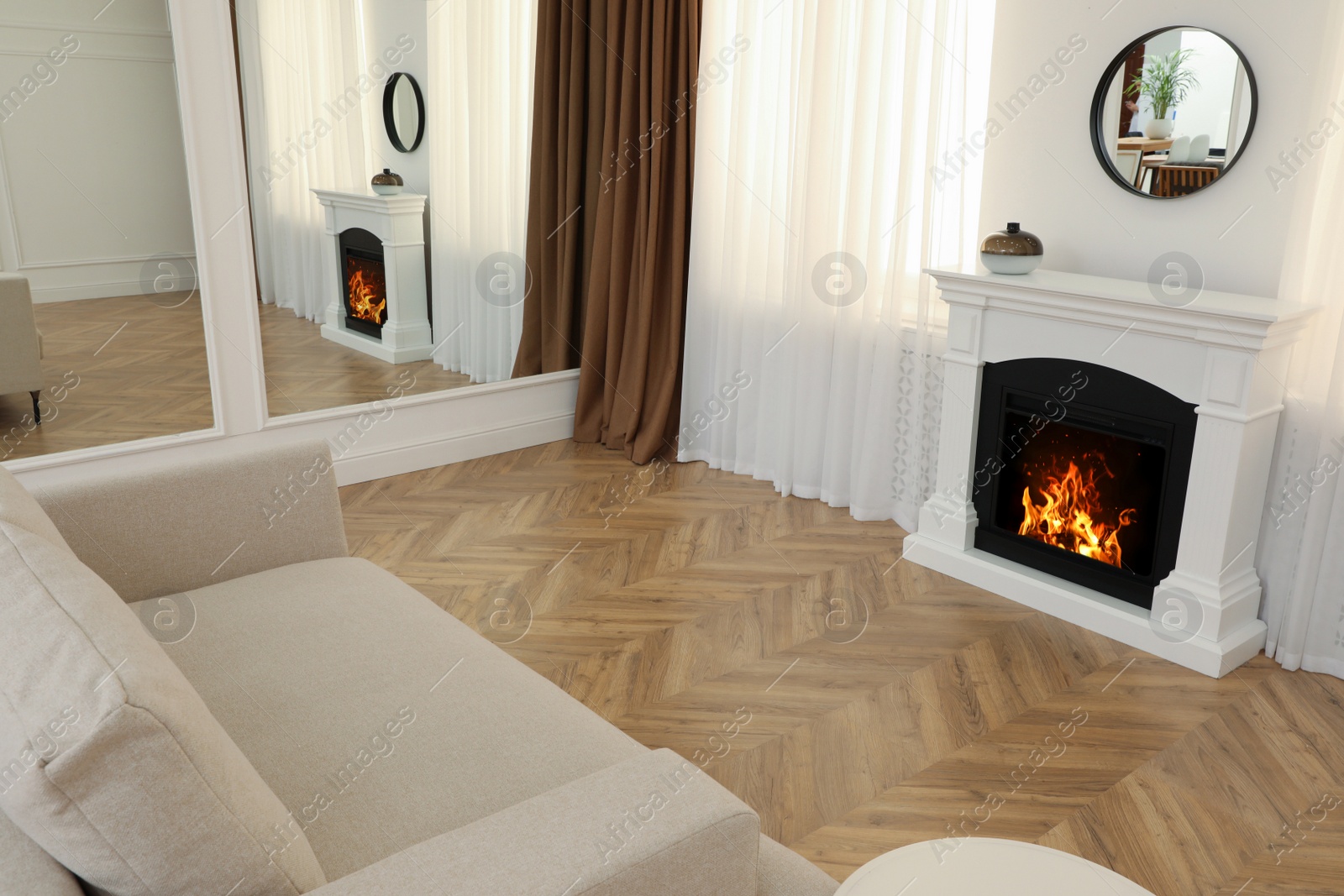 Photo of Modern living room with parquet flooring and fireplace