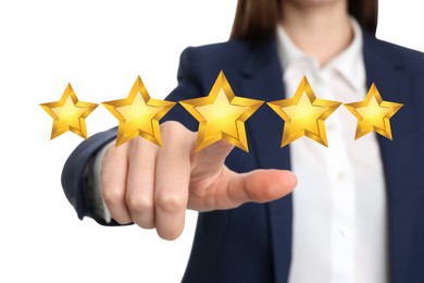 Image of Quality evaluation. Businesswoman touching virtual golden star on white background, closeup