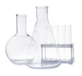 Photo of Set of empty laboratory glassware on white background