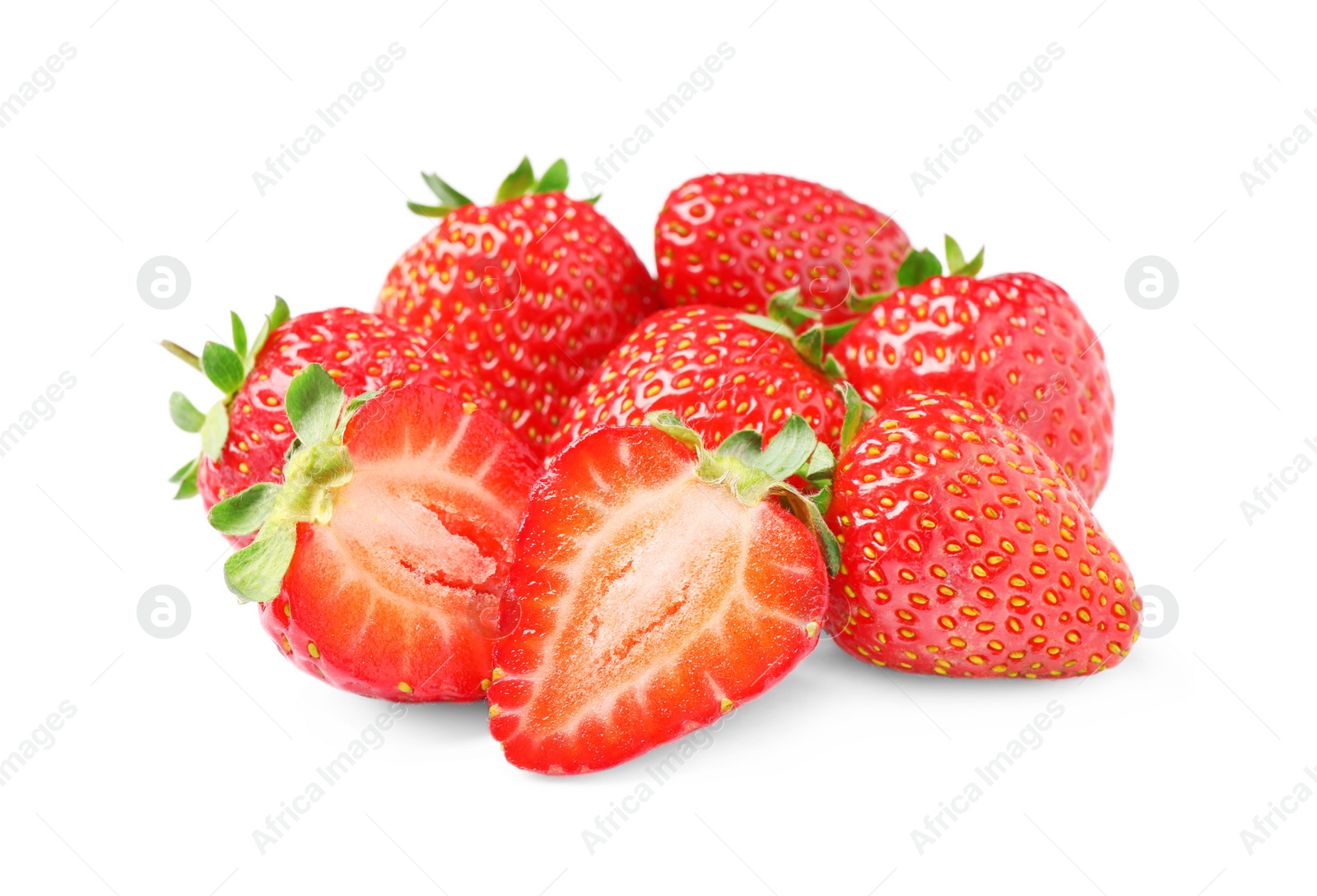 Photo of Pile of delicious cut and whole strawberries on white background