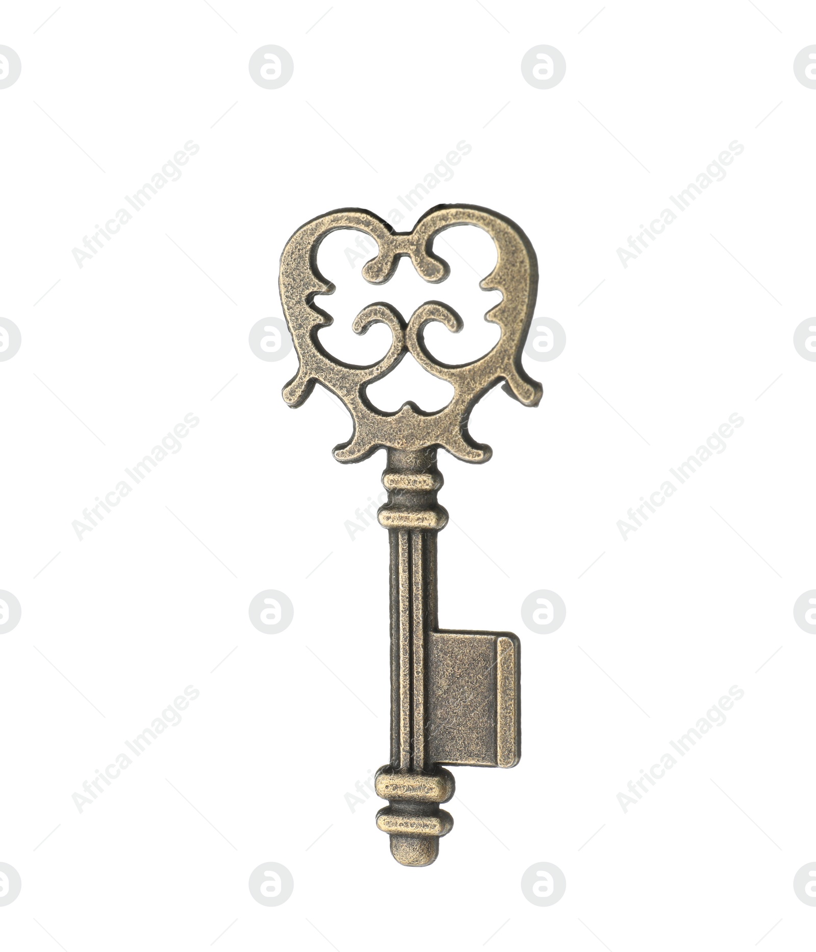 Photo of Bronze vintage ornate key on white background