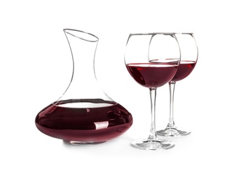 Photo of Elegant decanter and glasses with red wine on white background