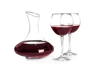 Elegant decanter and glasses with red wine on white background