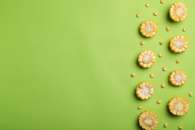 Flat lay composition with tasty sweet corn on color background