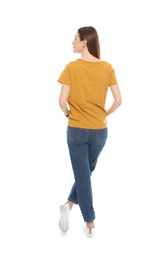 Photo of Young woman in t-shirt on white background. Mock up for design