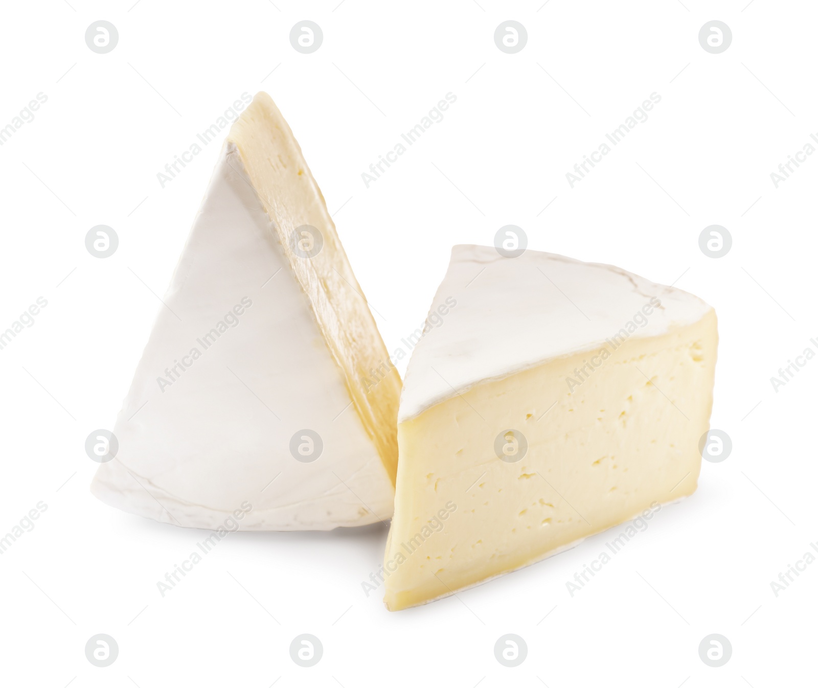 Photo of Pieces of tasty camembert cheese isolated on white