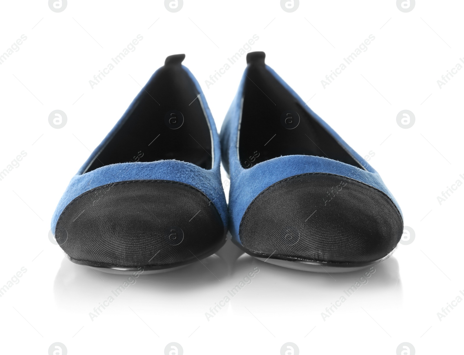 Photo of Pair of female shoes on white background