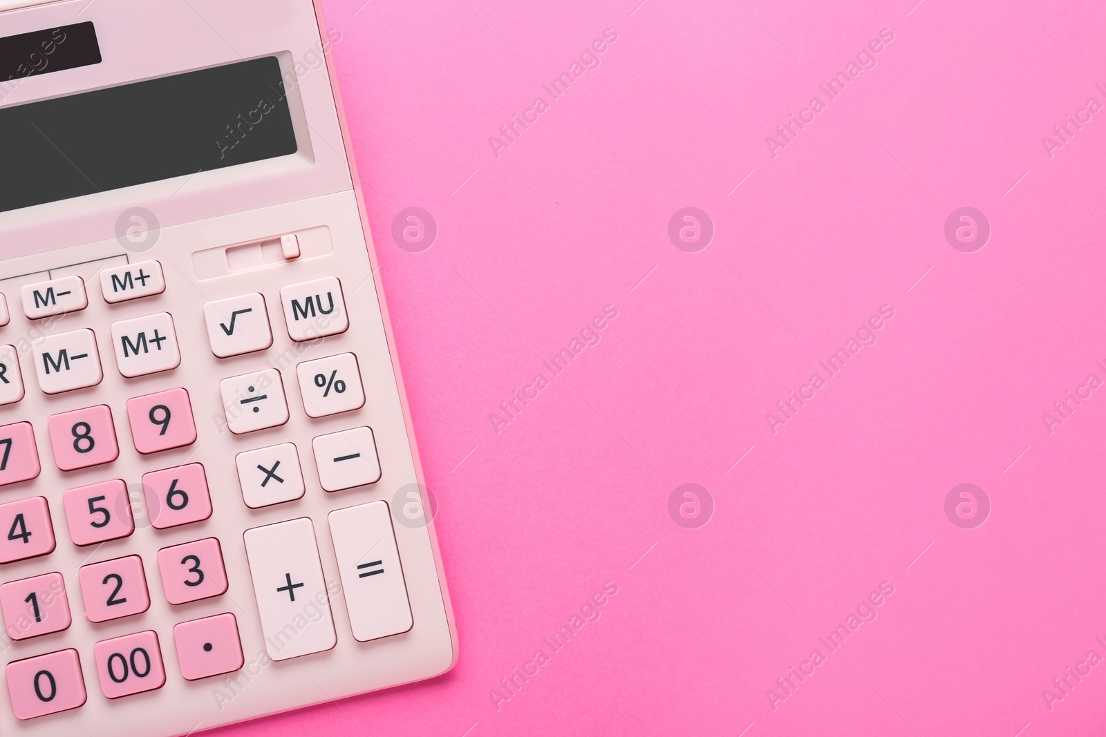 Photo of Modern calculator on pink background, top view. Space for text