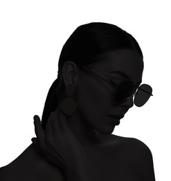 Silhouette of woman with sunglasses isolated on white