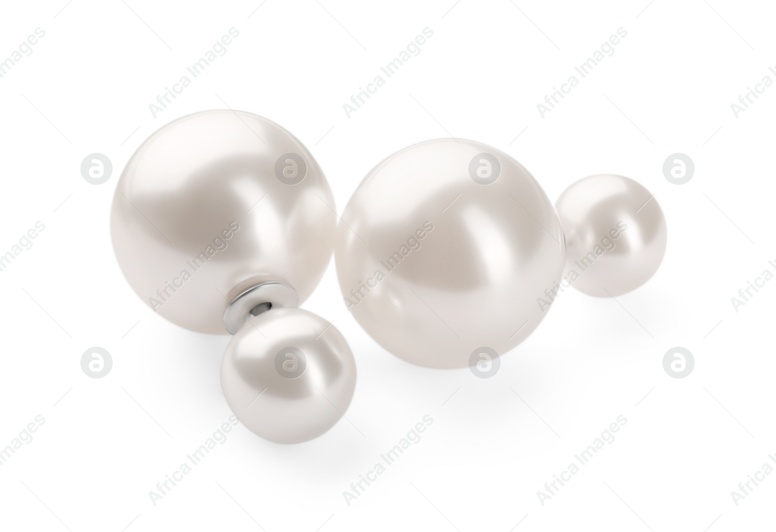 Photo of Elegant earrings with pearls isolated on white