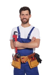 Professional plumber with pipe wrench and tool belt on white background