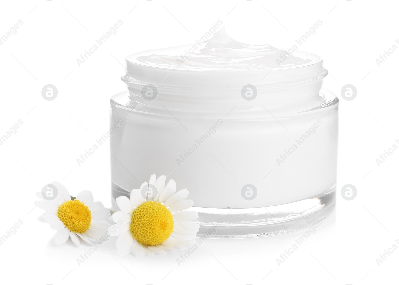 Photo of Chamomile flowers and jar of cream on white background