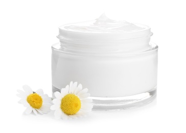 Photo of Chamomile flowers and jar of cream on white background