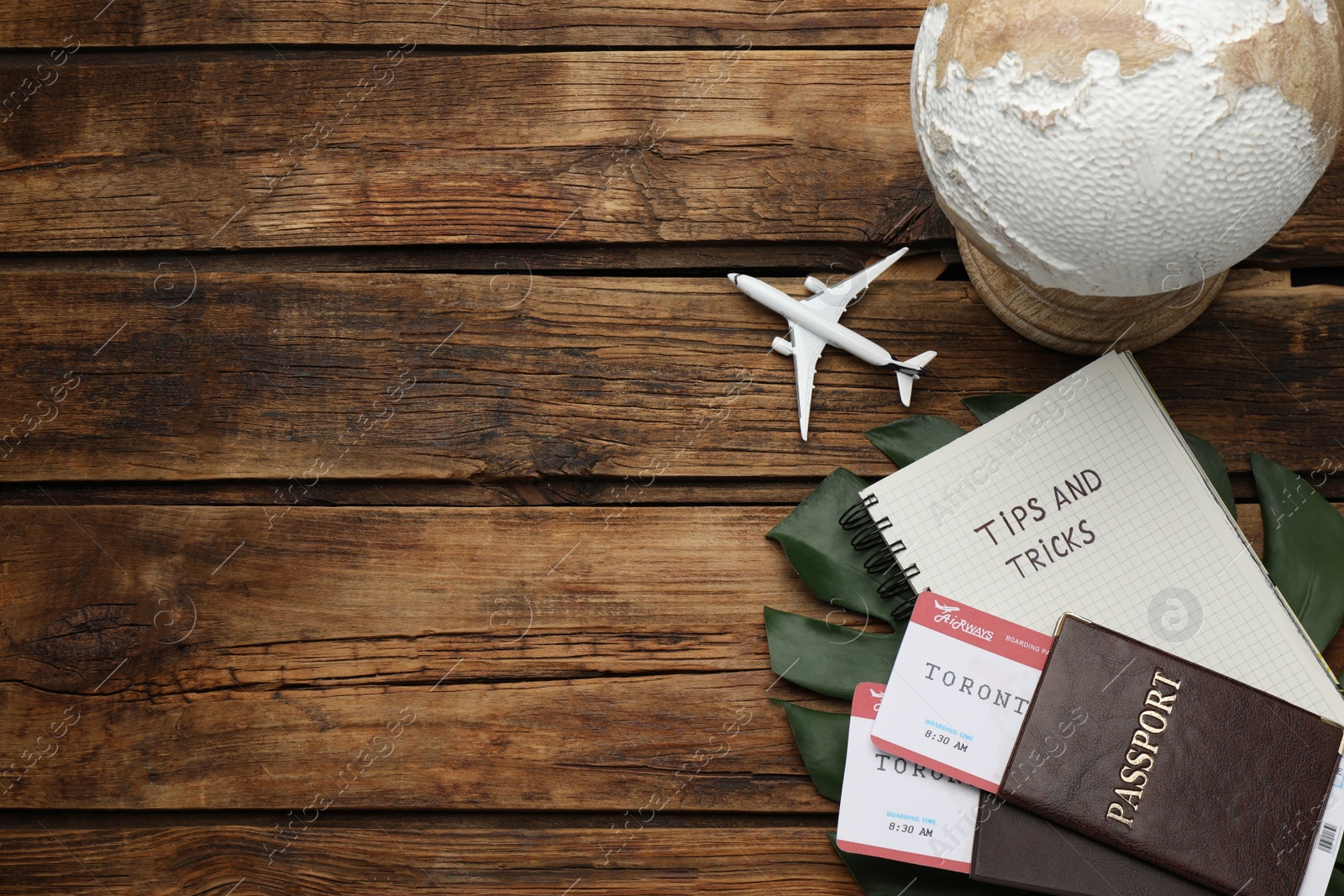 Photo of Flat lay composition with notebook on wooden table, space for text. Tips and Tricks