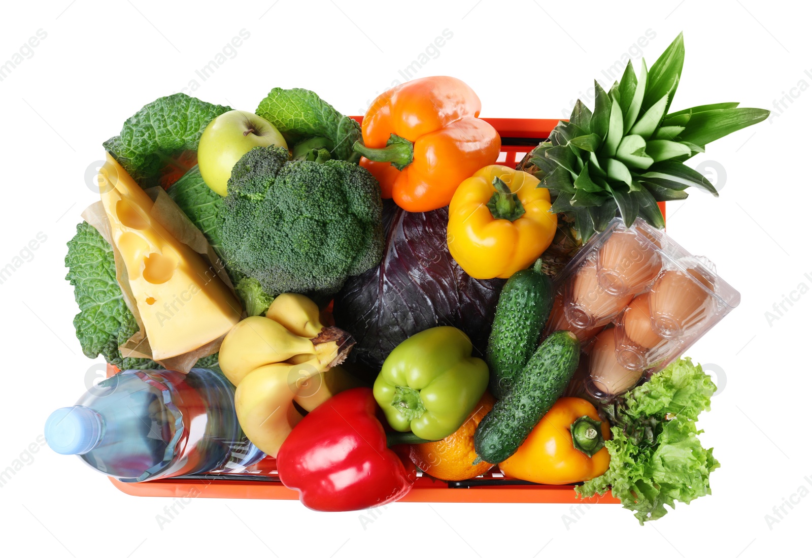 Photo of Shopping basket with grocery products on white background, top view