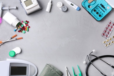 Flat lay composition with medical objects and space for text on grey background