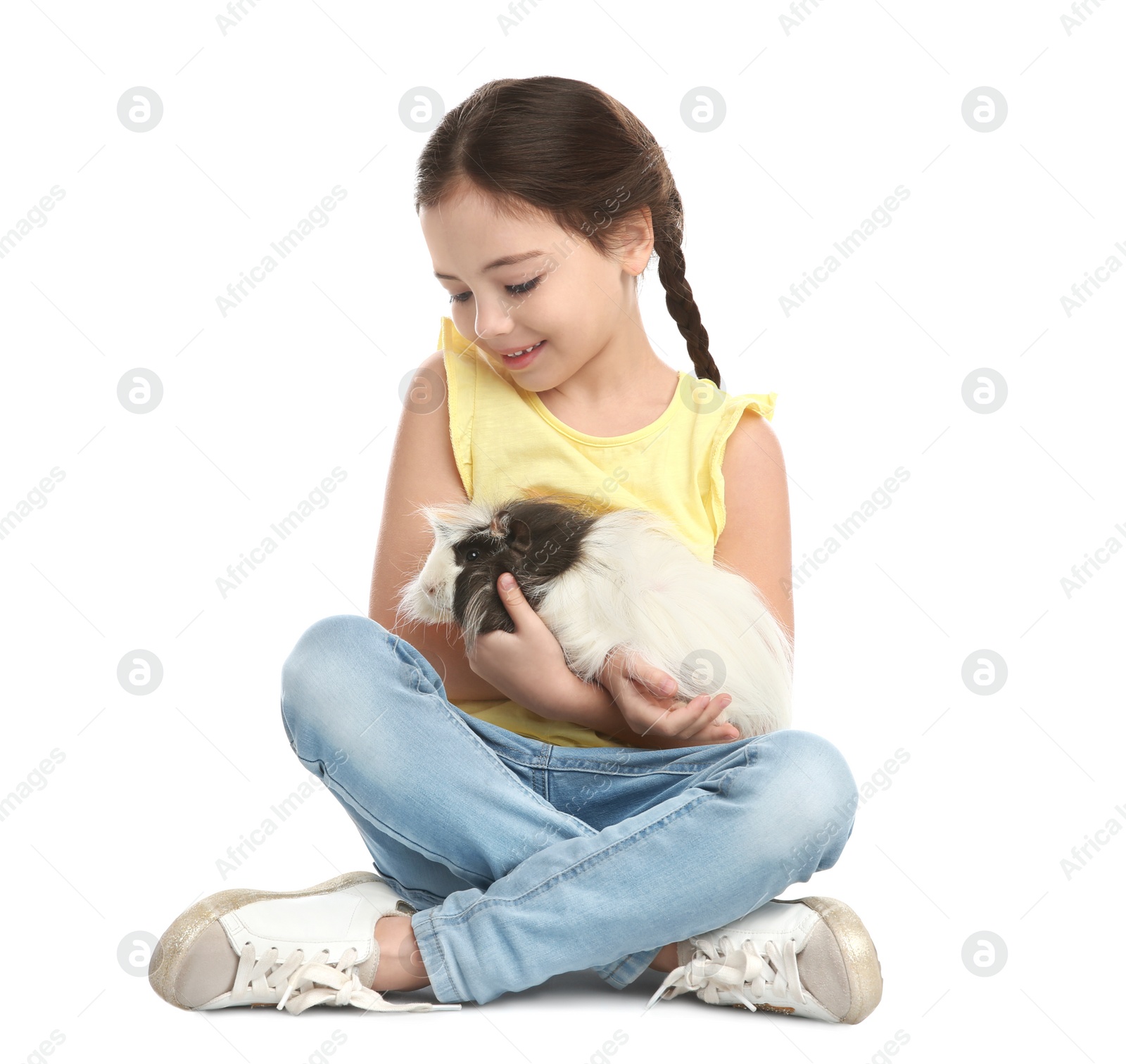 Photo of Happy little girl with guinea pig on white background. Childhood pet