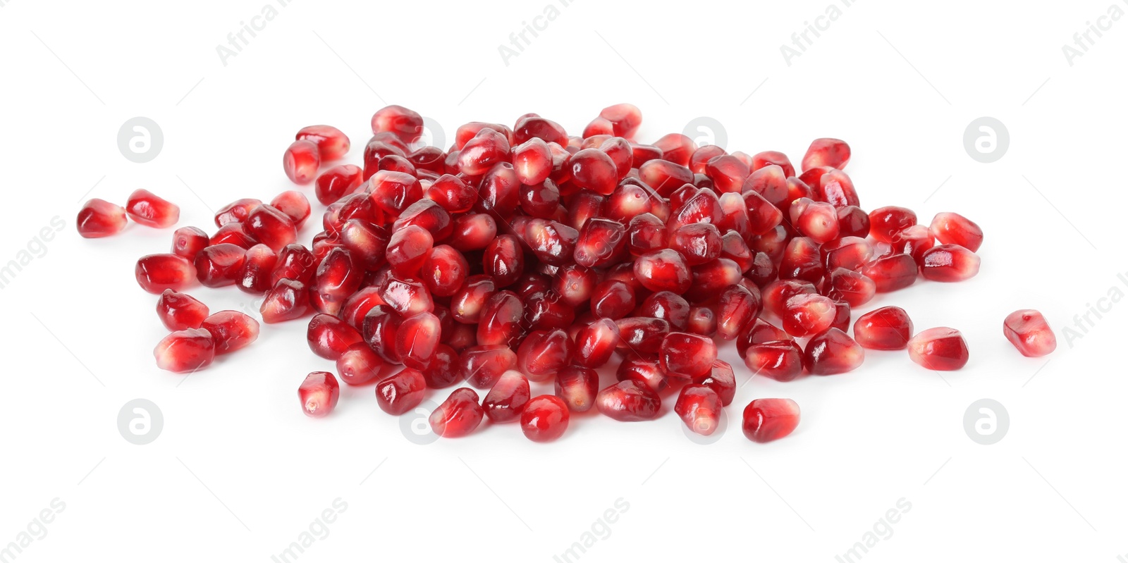 Photo of Pile of tasty pomegranate grains isolated on white