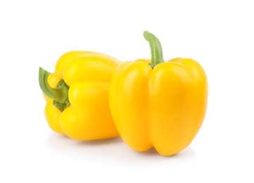 Ripe yellow bell peppers isolated on white