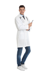 Full length portrait of doctor with clipboard on white background