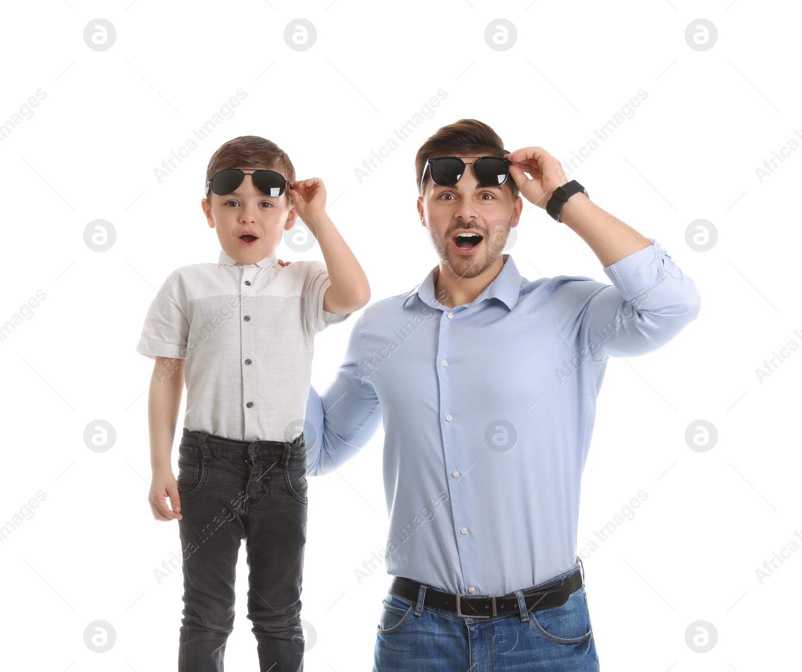 Photo of Portrait of emotional dad and his son isolated on white