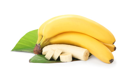 Photo of Delicious ripe bananas with leaves and pieces isolated on white