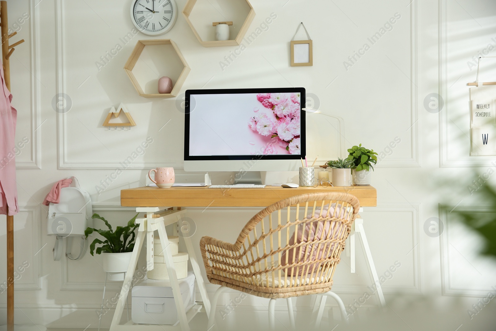 Photo of Stylish home office interior with comfortable workplace