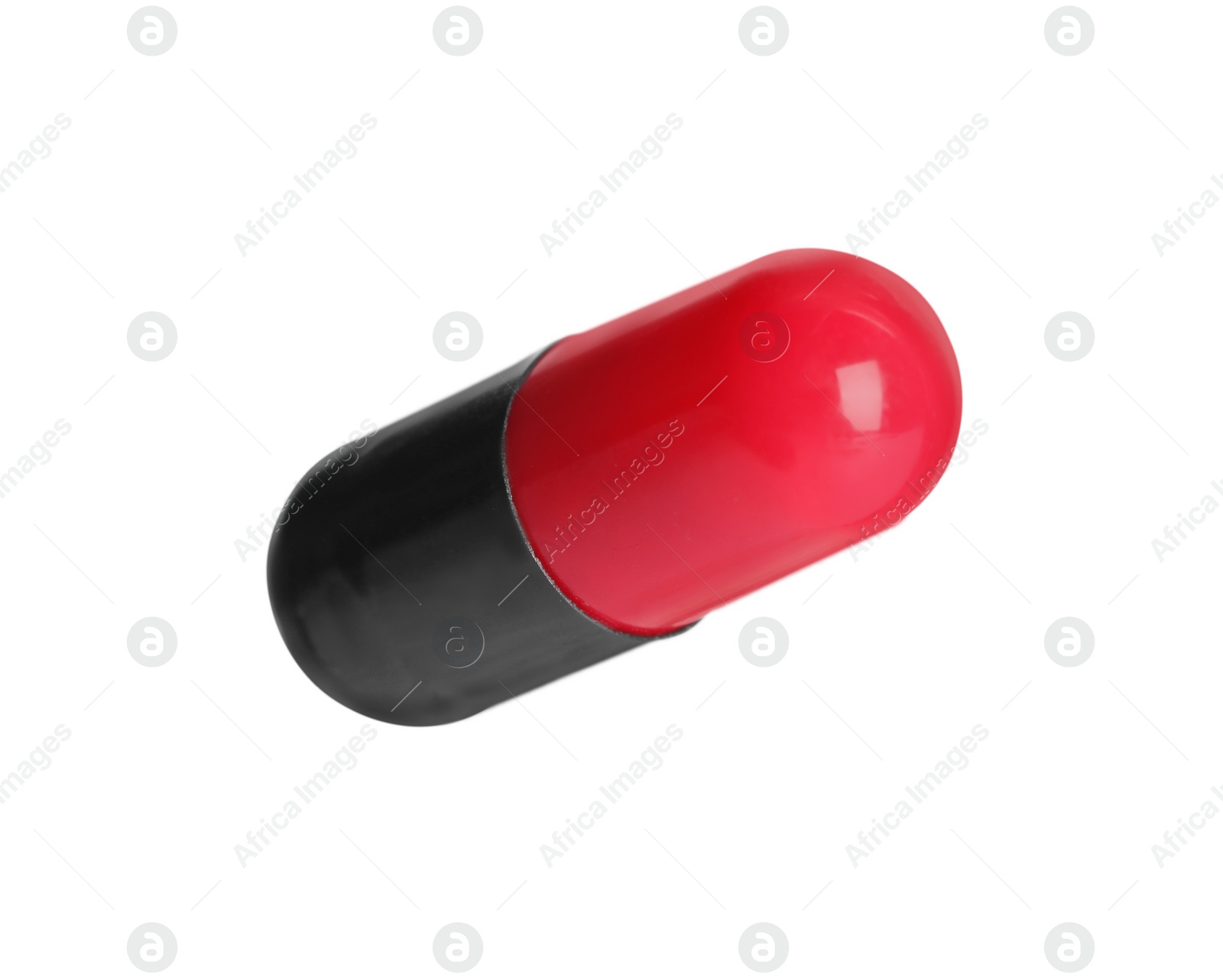 Photo of One pill isolated on white. Medicinal treatment