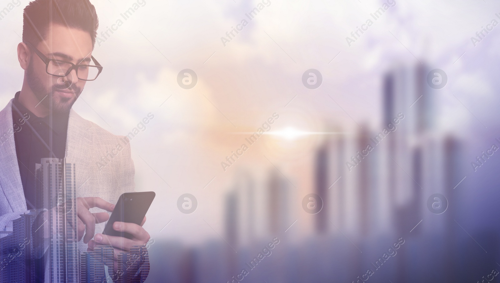 Image of Double exposure of businessman with smartphone and cityscape. Space for text