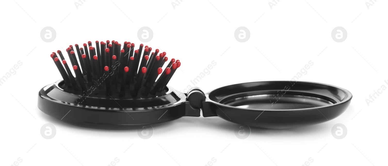 Photo of Round folding hair brush with mirror isolated on white