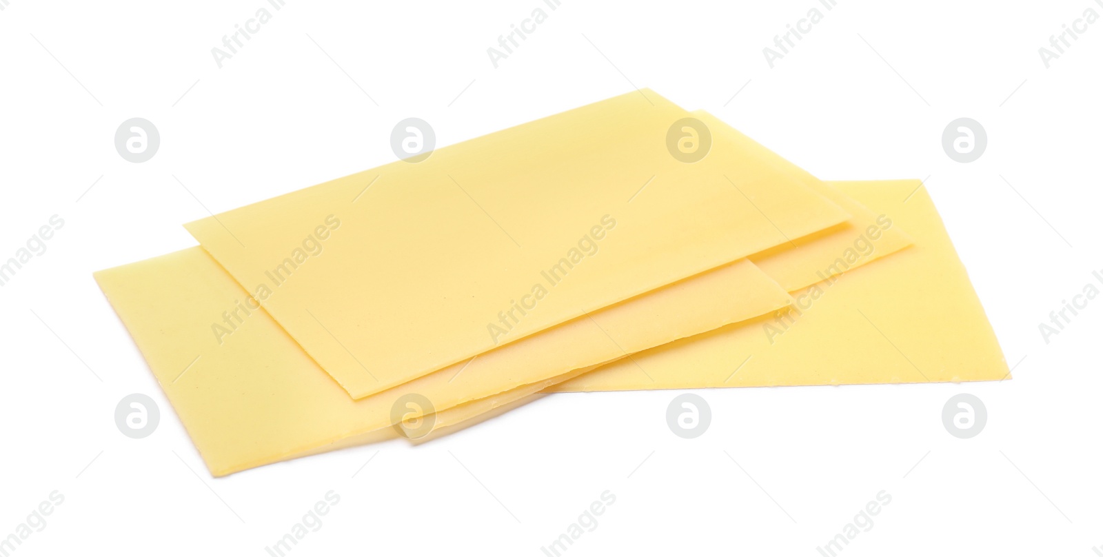 Photo of Stack of uncooked lasagna sheets isolated on white