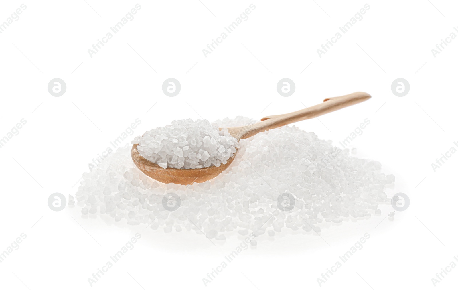 Photo of Wooden spoon with salt isolated on white