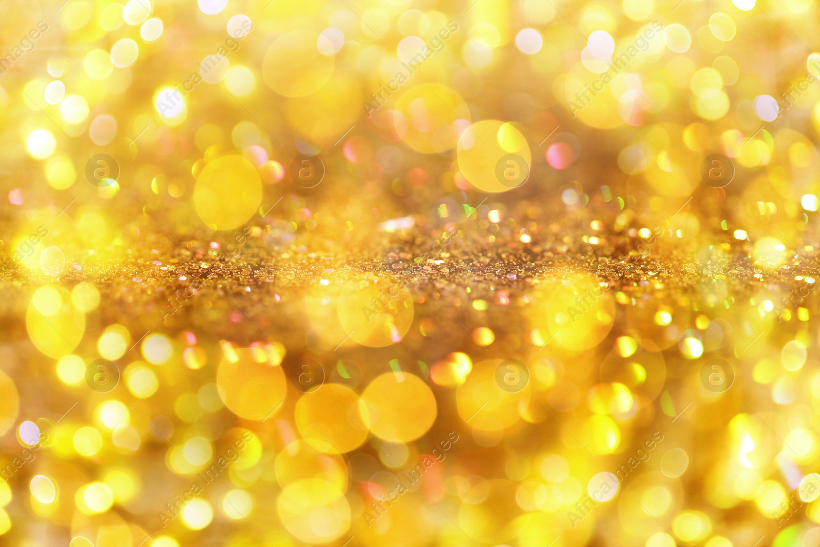 Image of Gold glitter with bokeh effect as abstract background