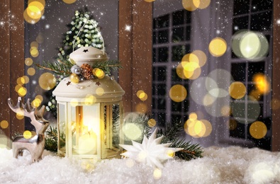 Image of Beautiful composition with Christmas lantern near window