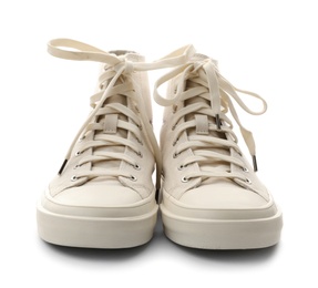 Photo of Stylish sneakers on white background