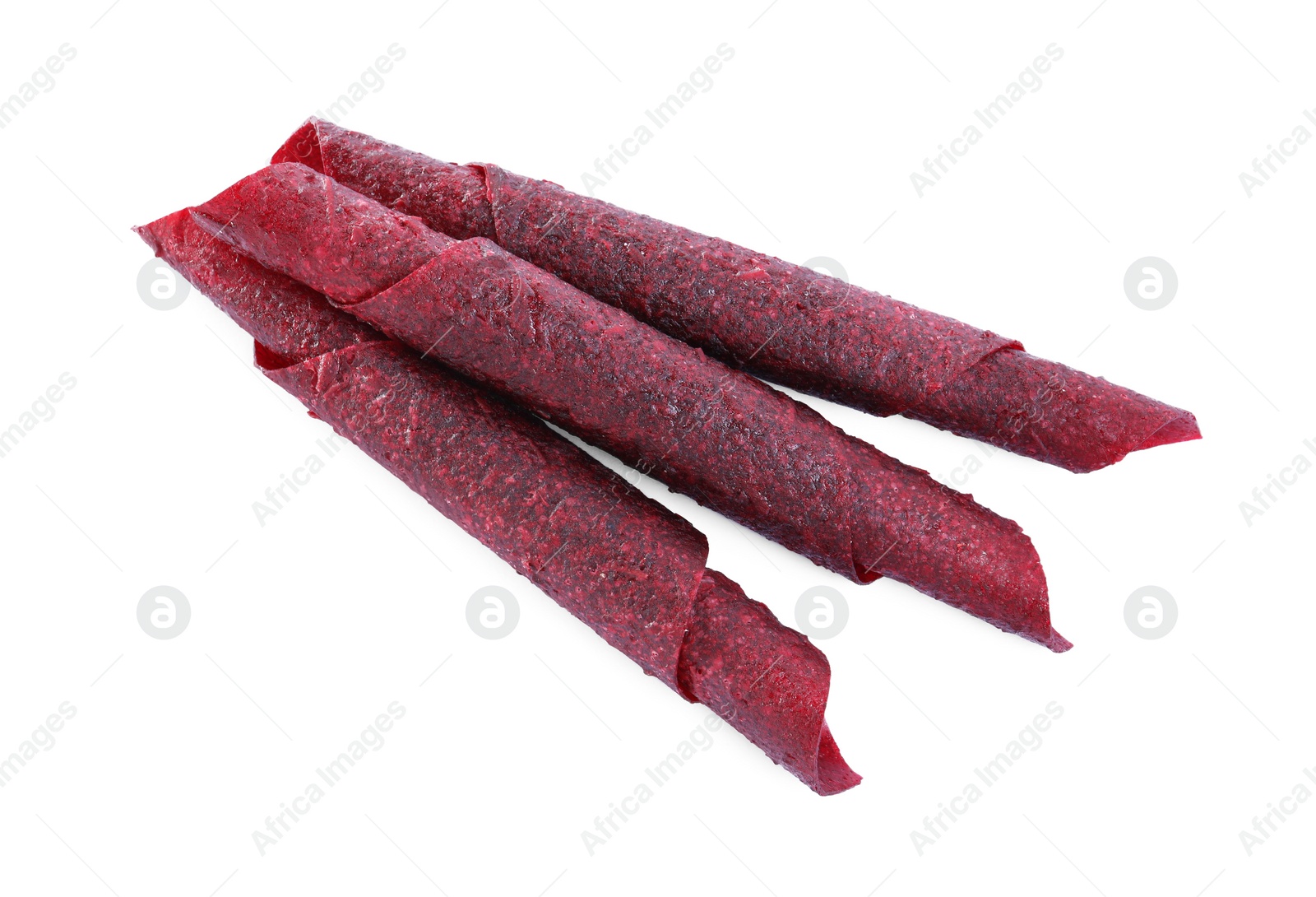 Photo of Delicious fruit leather rolls on white background, top view