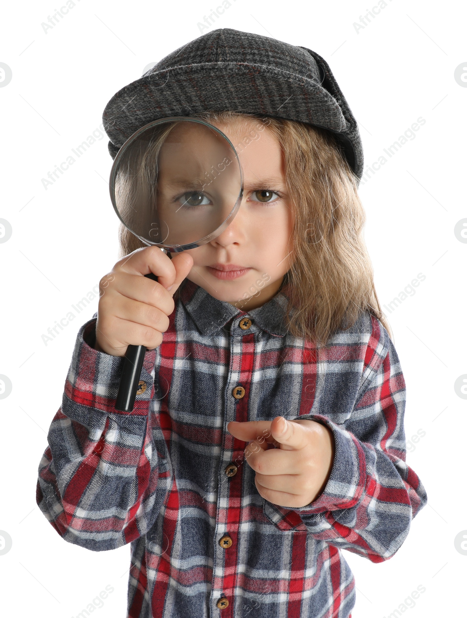 Photo of Cute little child in hat with magnifying glass playing detective on white background