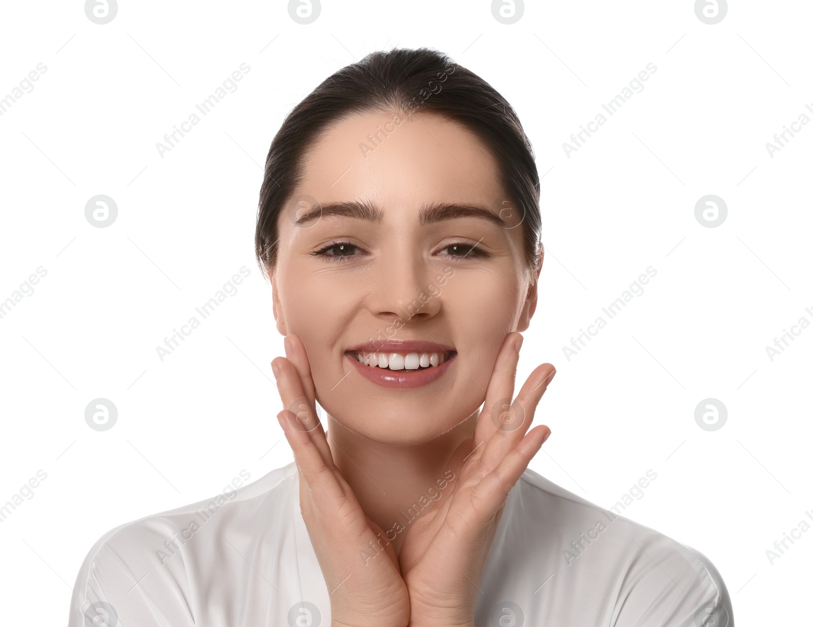 Photo of Young woman massaging her face on white background