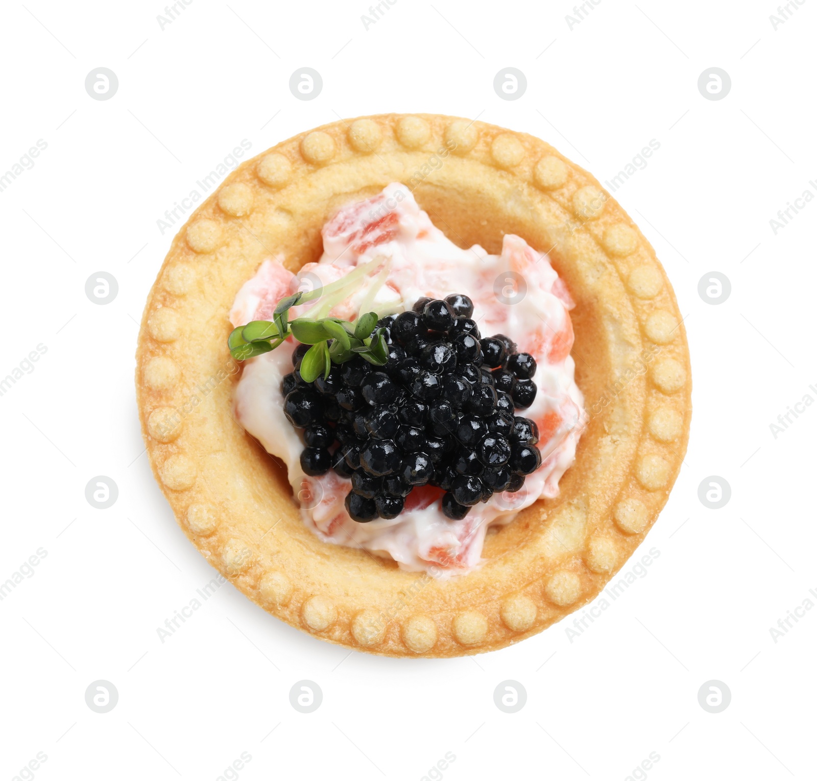 Photo of Delicious canape with black caviar isolated on white, top view