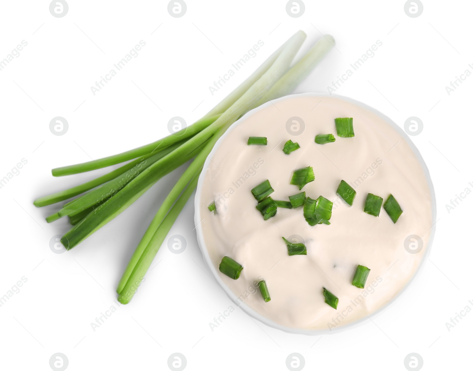 Photo of Fresh sour cream with onion on white background, top view