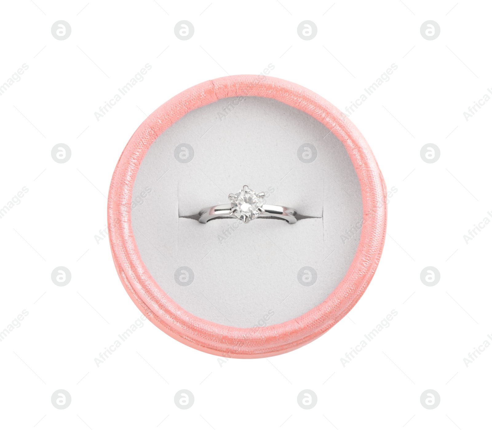 Photo of Beautiful engagement ring with gemstone in box isolated on white, top view
