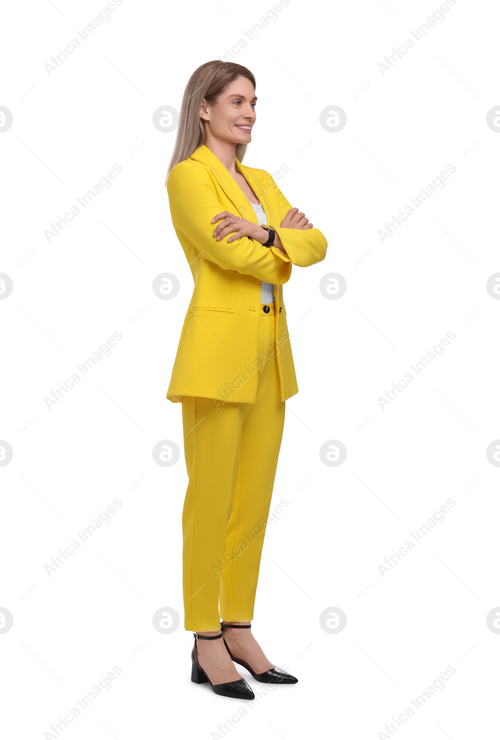 Photo of Beautiful happy businesswoman crossing arms on white background