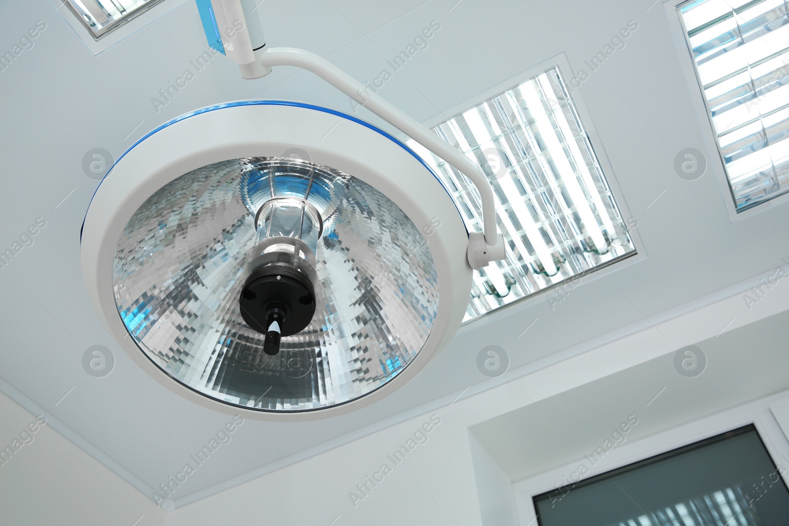 Photo of Powerful surgical lamp in modern operating room