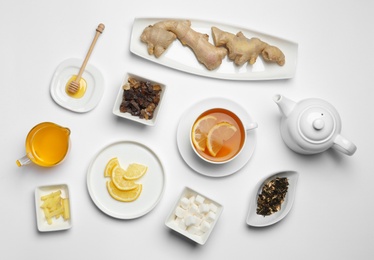 Photo of Composition with lemon tea on white background, top view